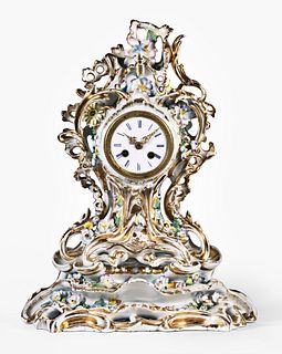 French porcelain mantel clock with elaborate rococo porcelain case