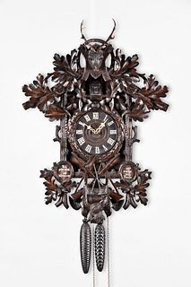 Black Forest, hand carved cuckoo clock in hunter motif