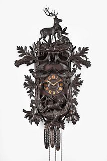 Black Forest hanging cuckoo clock depicting romantic forest scene, stag and doe