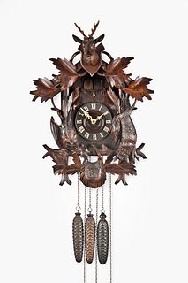 Black Forest, Germany, cuckoo and quail wall clock