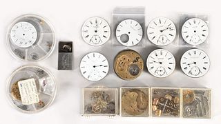 An interesting lot of E. Howard movements, parts, and a partial 4 size Waltham crystal plate