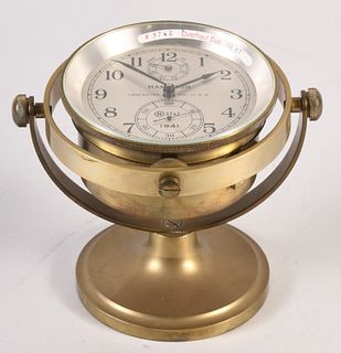 A Hamilton model 21 marine chronometer with gimballed desk stand