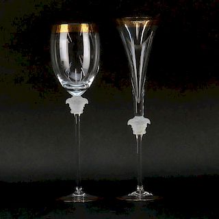Grouping of Seven (7) Rosenthal Versace Medusa Lumiere Clear Crystal Stemware. Includes: 4 fluted champagne glasses and 3 wat