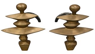 A Pair of Giacometti Style Polished Bronze Andirons