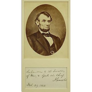 Antique Photograph of Abraham Lincoln with a separate hand written inscription "Submitted to the Secretary of War, & Genl in 