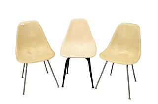 A Pair of 50's Herman Miller Fiberglass Side Chairs along with a Similar Style Chair