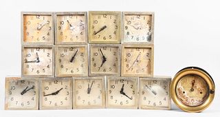 Thirteen Art Deco slave clocks