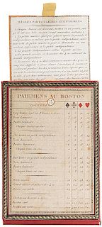Boston Whist Marker. “Paiemens Au Boston.” Red Leather Case Trimmed in Black & Gold with Set of Rules and Ivory Disc Coun