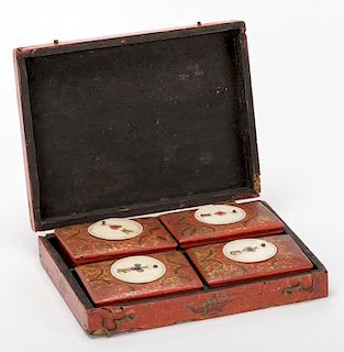 Four Lacquered Quadrille Boxes with Ivory Scorers on the Lids and Bone Markers Inside, Set Inside a Lacquer Case.