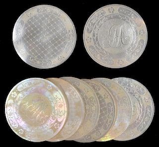Set of Eight Mother of Pearl Gambling Chips.