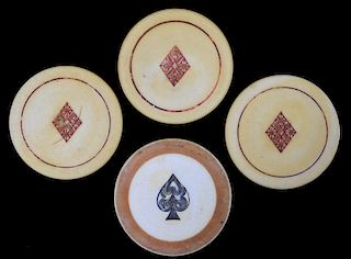 Four Suit Symbol Scrimshawed Ivory Poker Chips.