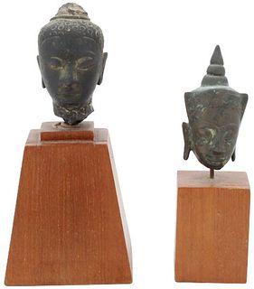 Two Early Bronze Asian Heads on Stands