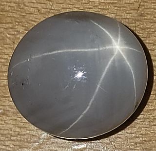 19.12 Carat Oval Light Grey Star Sapphire Stone