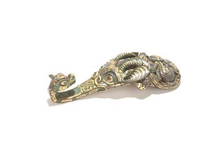 A Bronze Gilt and Silver-Inlaid Belt Buckle