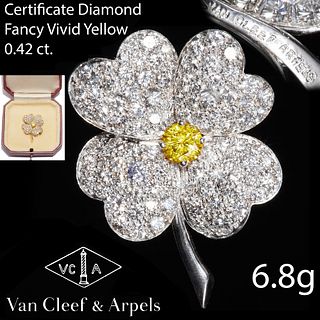 VAN CLEEF & ARPELS 'COSMOS' FANCY VIVID YELLOW AND WHITE DIAMOND BROOCH