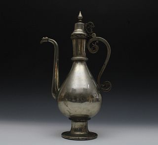 An Islamic Ottoman Copper Silver Polished Ewer Aftaba from the 19th Century.

H: Approximately 40cm 