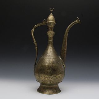 A Rare Persian Brass Aftaba Ewer from the 19th Century Decorated with People and Floral Designs.

H: Approximately 40cm 