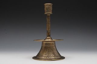 An Italian Brass Candlestick Made for the Islamic Market.

H: Approximately 20cm
D: Approximately 12.2cm 