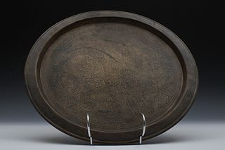 An Islamic Brass Round Tray with Islamic Calligraphy.

D: Approximately 34.3cm 