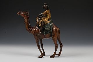 A Rare Signed Bergman Bronze Statue of a Man on a Camel from the 19th Century made for the Turkish Islamic Market.

H: Approximately 21.5cm 