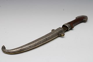An Islamic Moroccan Silver and Brass Dagger.

L: Approximately 39cm 