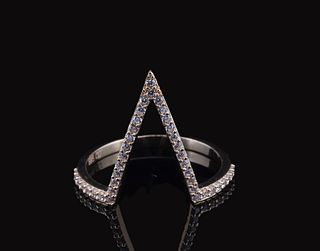 An angular white gold ring with Zirconia pavé details forming a V-shaped design.