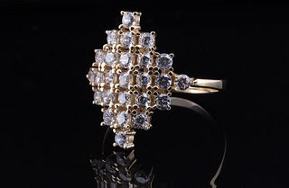 A statement ring with a dense cluster of sparkling gemstones 