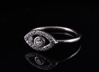 Contemporary white gold ring featuring a teardrop-shaped frame. 