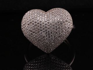 Charming heart-shaped gold ring fully embellished with numerous small, shimmering stones,