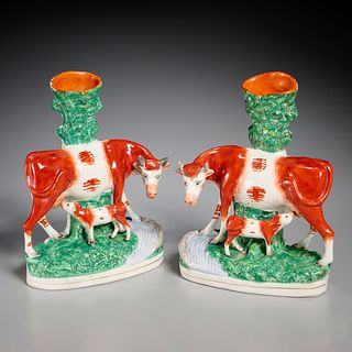 Pair Staffordshire cow and calf spill vases