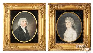 Pair of pastel oval portraits of a man and woman