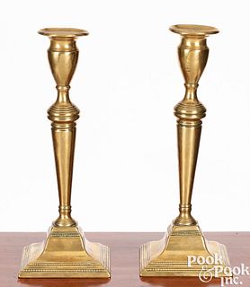 Tall pair of George III brass candlesticks