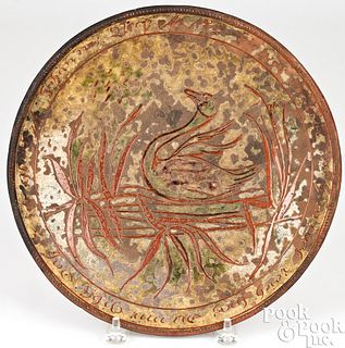 Pennsylvania sgraffito redware charger, dated 1812