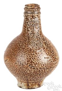 Small German stoneware Bellarmine jug, 17th c.