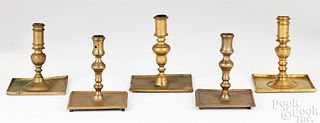 Five Spanish brass candlesticks