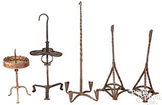 Five wrought iron lighting devices, late 17th c.