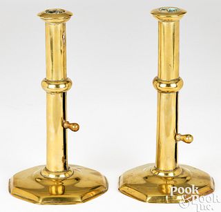 Pair of English brass side ejector candlesticks