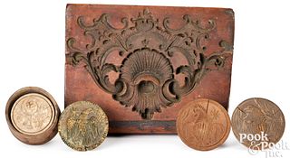 Four Pennsylvania carved butter molds