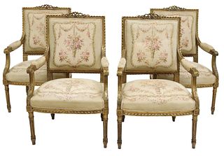 (4) LOUIS XVI STYLE NEEDLEPOINT-UPHOLSTERED GILTWOOD FAUTEUILS