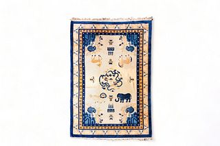 A Chinese woolen 'Beijing' pictorial animal rug with a blue elephant, first quarter of the 20th Century