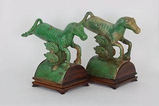 A pair of Chinese glazed pottery roof tiles, 17th Century
