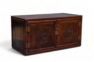 A low Chinese hongmu wooden two-door cupboard, 19th Century