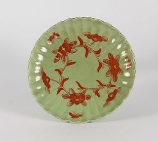 A Chinese celadon and iron red decorated lobbed plate, 19th Century
