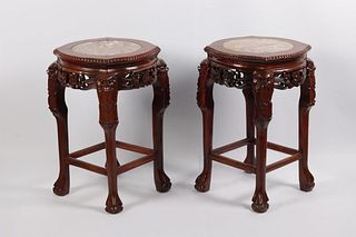 A pair of Chinese carved wood stands, 19th Century