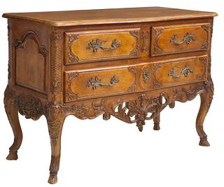FINELY CARVED LOUIS XV STYLE WALNUT THREE-DRAWER COMMODE