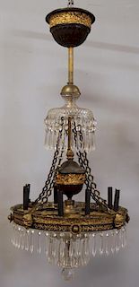 Patinated and Gilt Metal Cut Glass Chandelier.