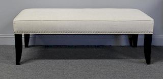 Upholstered Window Bench with Lacquered Legs.