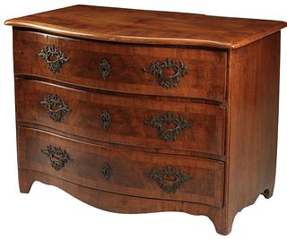 CONTINENTAL BAROQUE STYLE BANDED THREE-DRAWER COMMODE