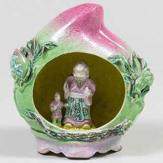 Chinese Famille Rose Porcelain Model of an Immortal in a Peach