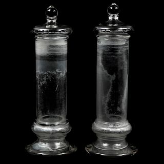 PAR DE FRASCOS CHECOSLOVAQUIA SIGLO XX Elaborados en cristal transparente Diseños cilindricos Decoración lisa  42 cm alt...